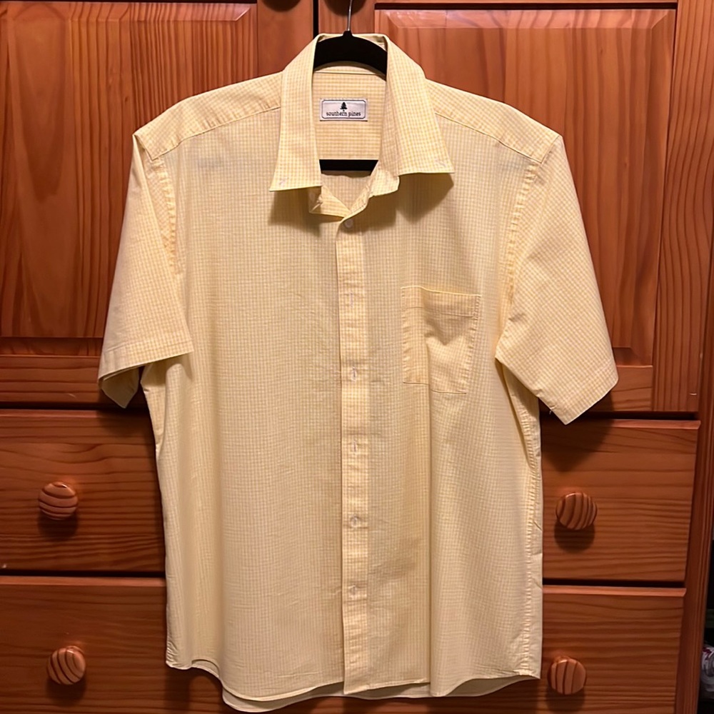 Southern Pines yellow short sleeve shirt.
